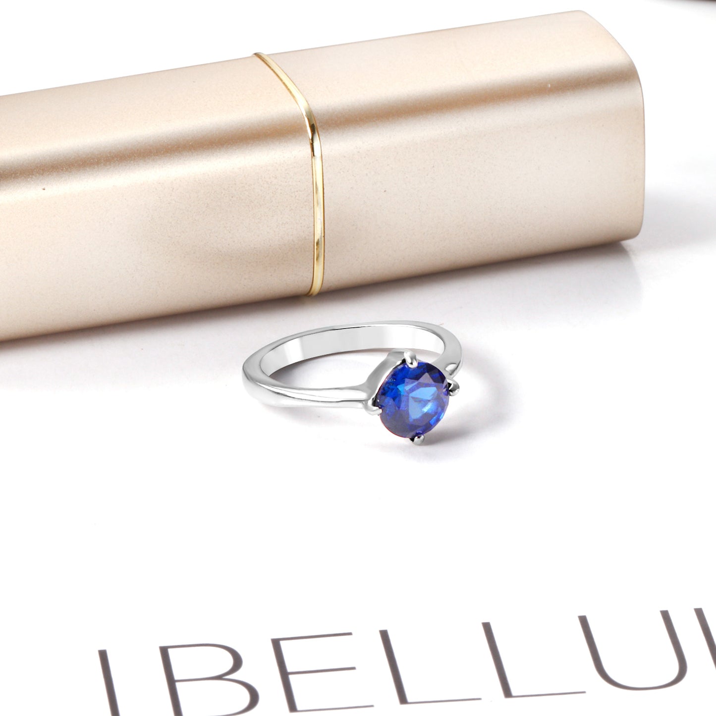 White Gold Plated Blue Stone Crowned Ring