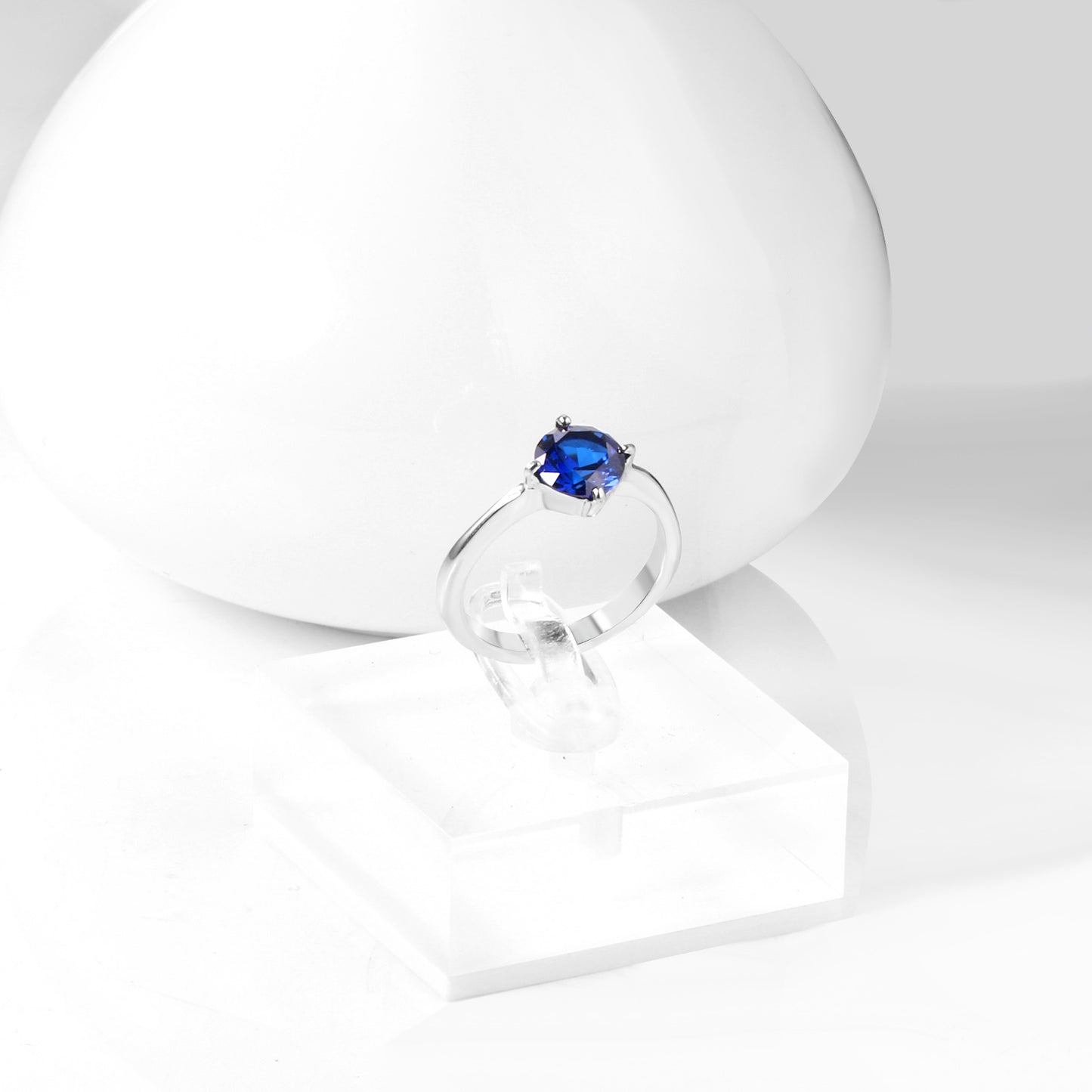 White Gold Plated Blue Stone Crowned Ring