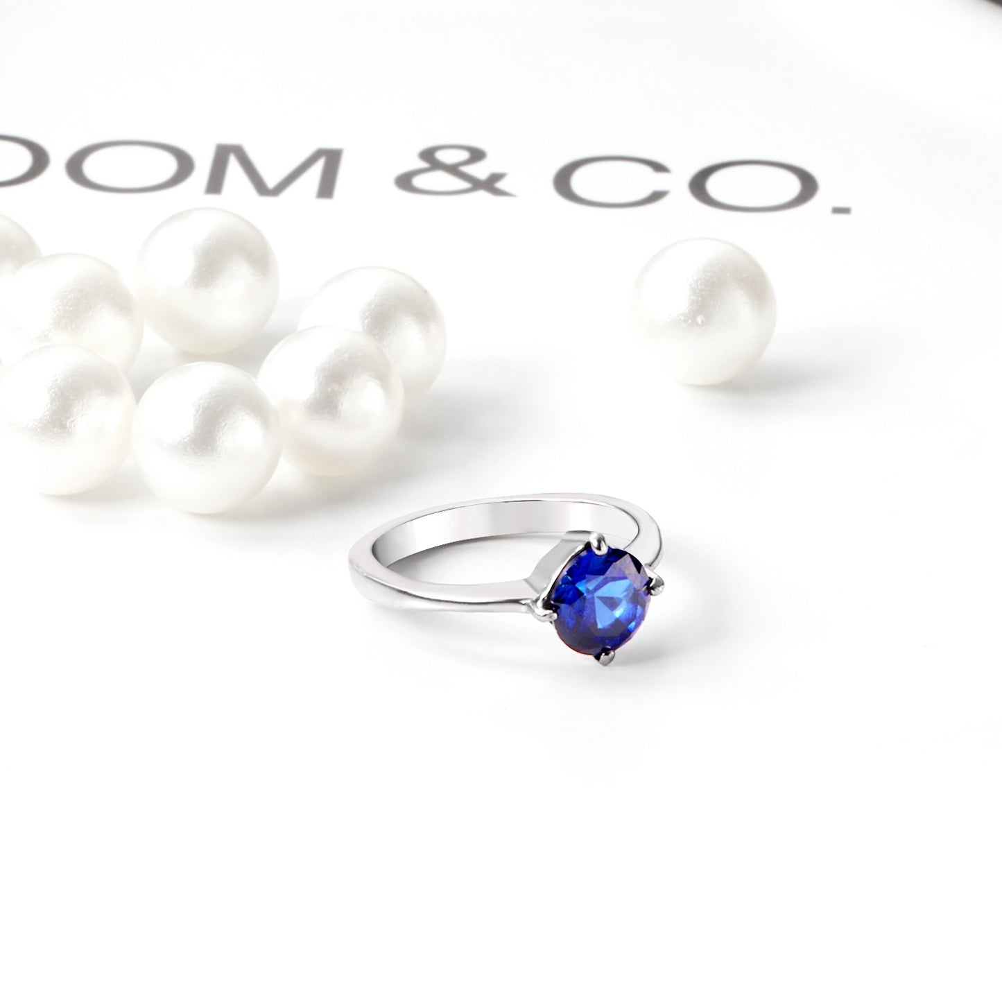 White Gold Plated Blue Stone Crowned Ring